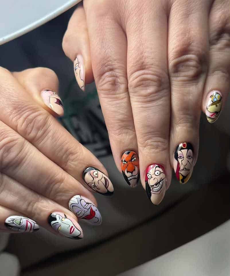 Hands displaying detailed Disney villain character nail art