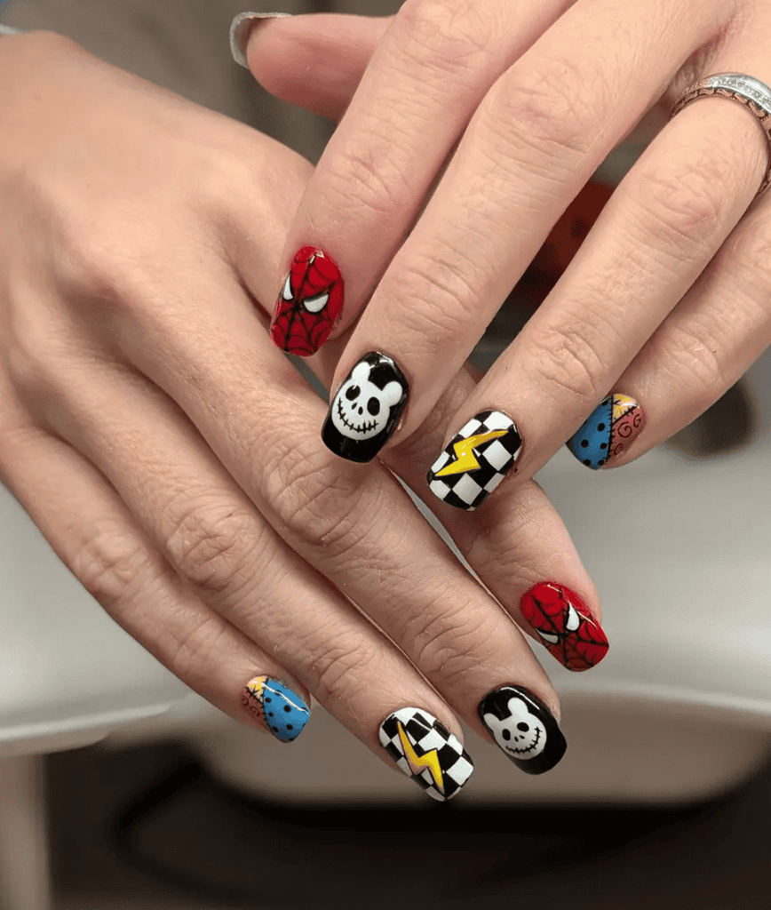 Hands with colourful comic-inspired character nail art
