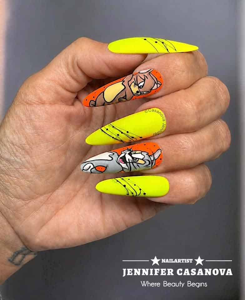 Neon yellow and cartoon character stiletto nail art