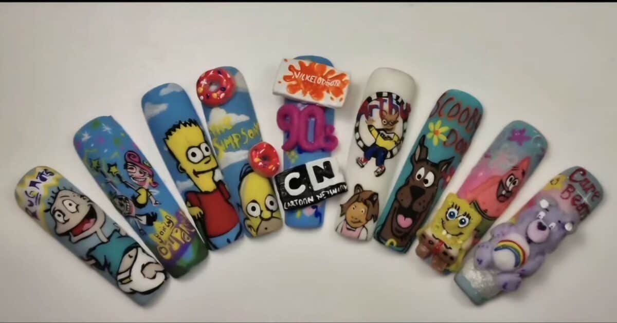 Colourful cartoon character nail art designs on artificial nails
