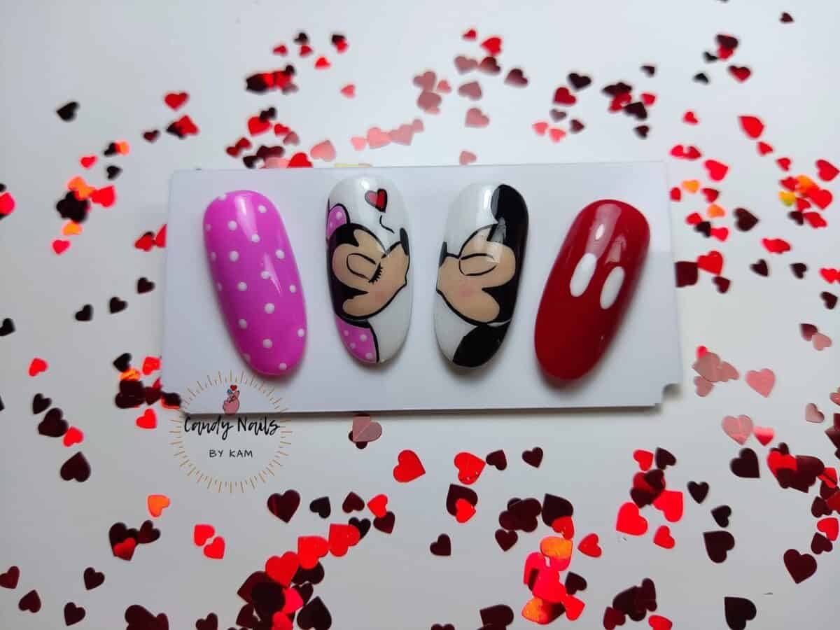 Valentine’s nail art samples with kissing couple and hearts