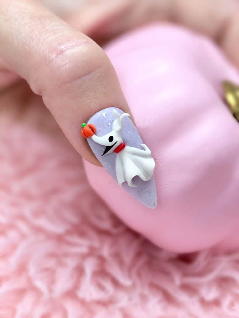 Ghost nail art with pumpkin on lavender stiletto nail