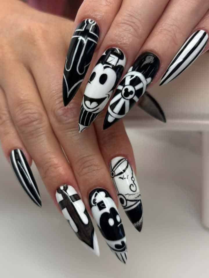 Black and white cartoon character stiletto nail art
