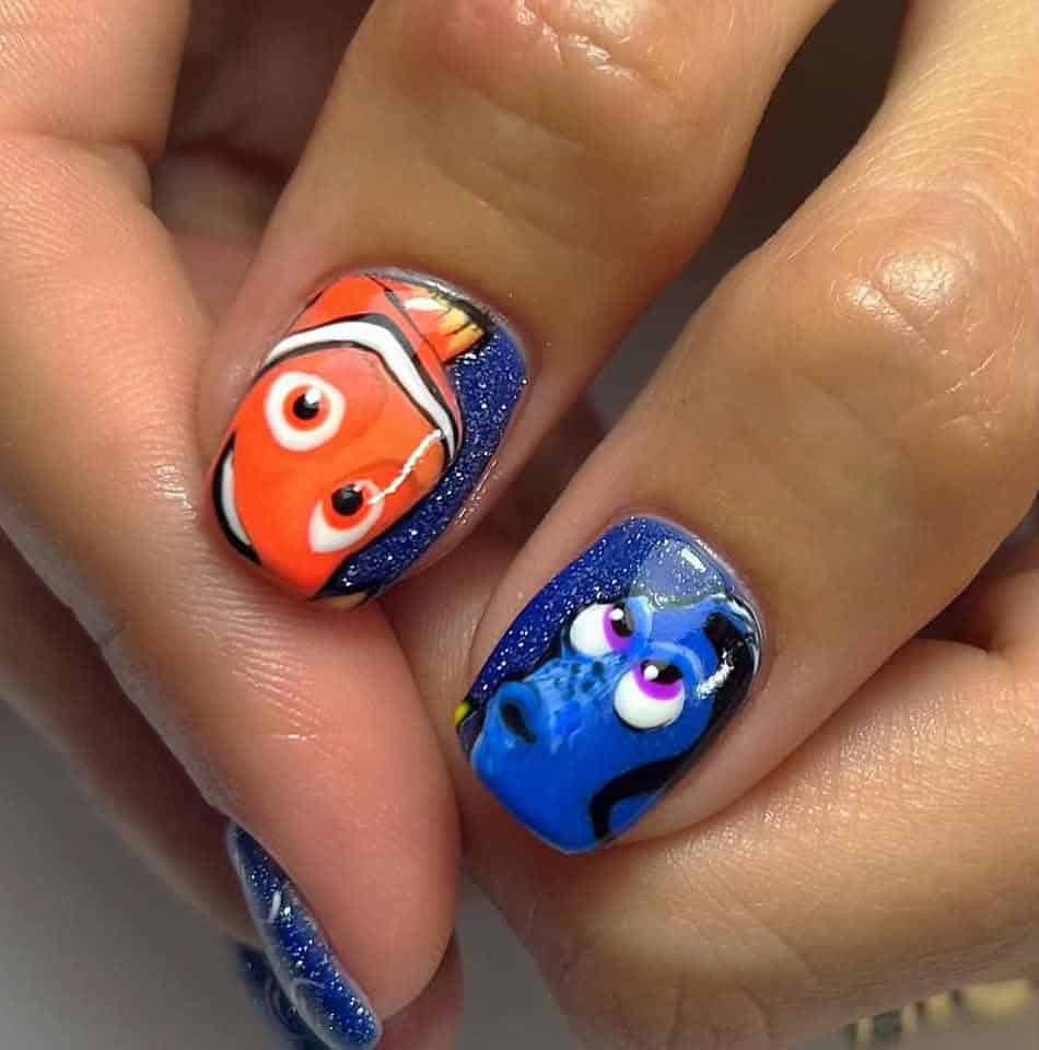 Finding Nemo character nail art on glittery blue nails
