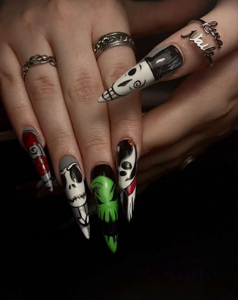 Hands with elaborate horror-themed character nail art