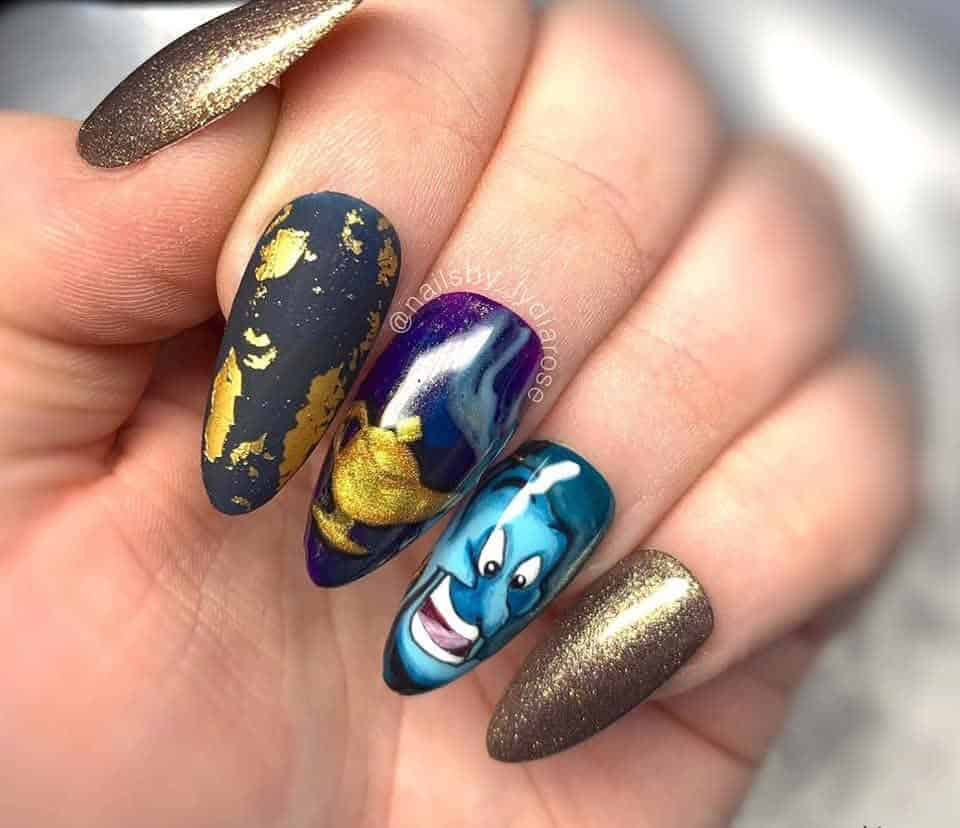 Aladdin-inspired blue genie and gold nail art