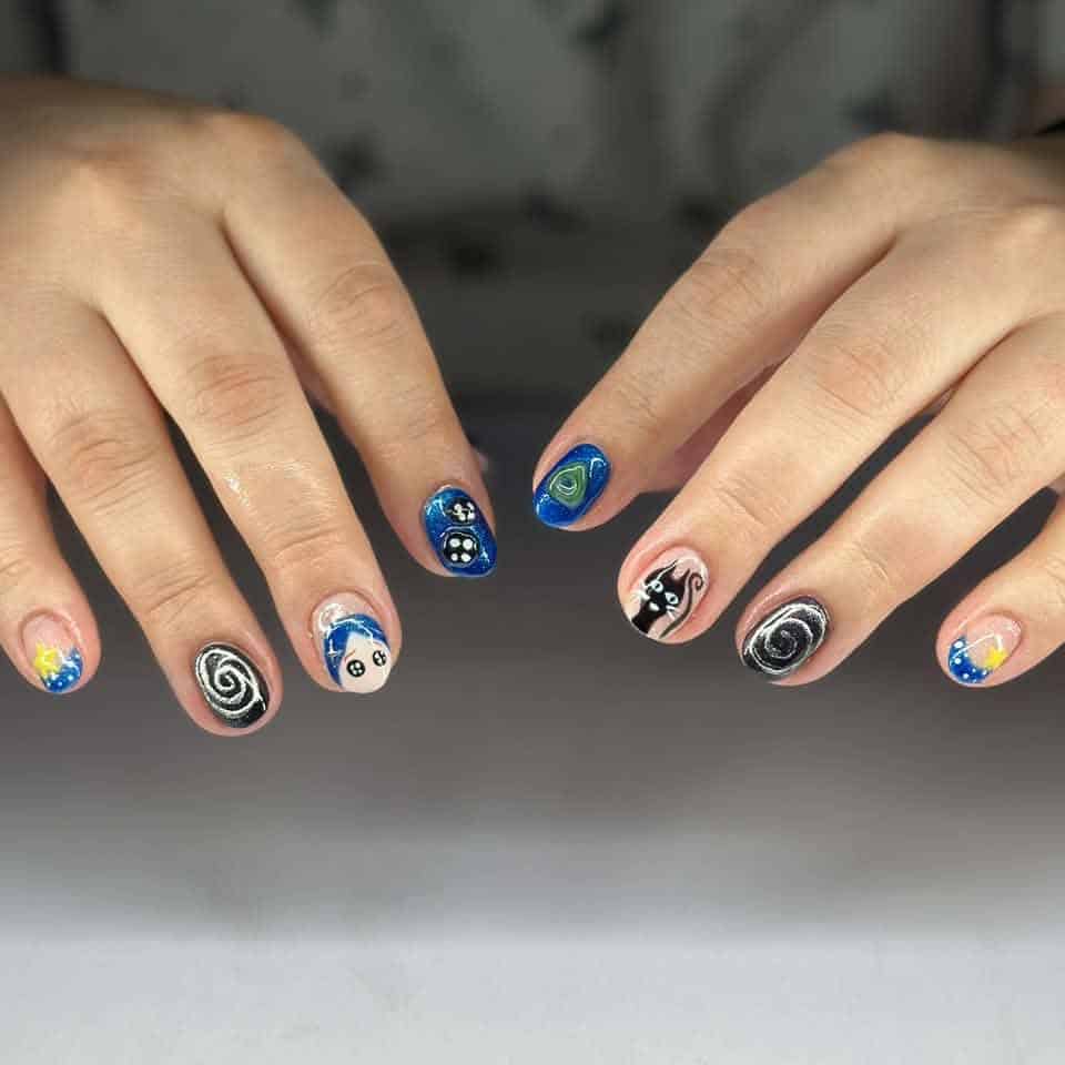 Hands displaying colourful cosmic-themed nail art designs