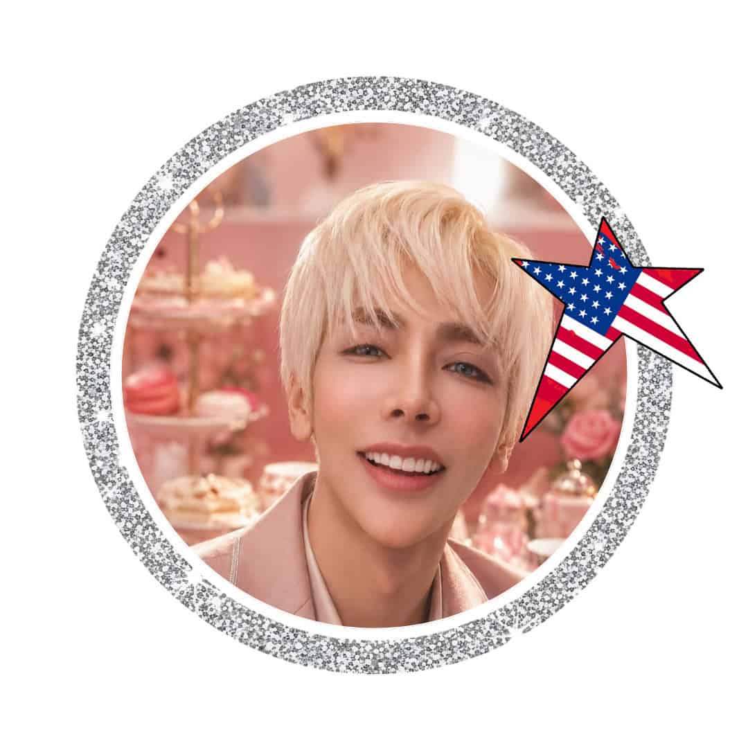 Smiling blond person in glittery circular frame with US star